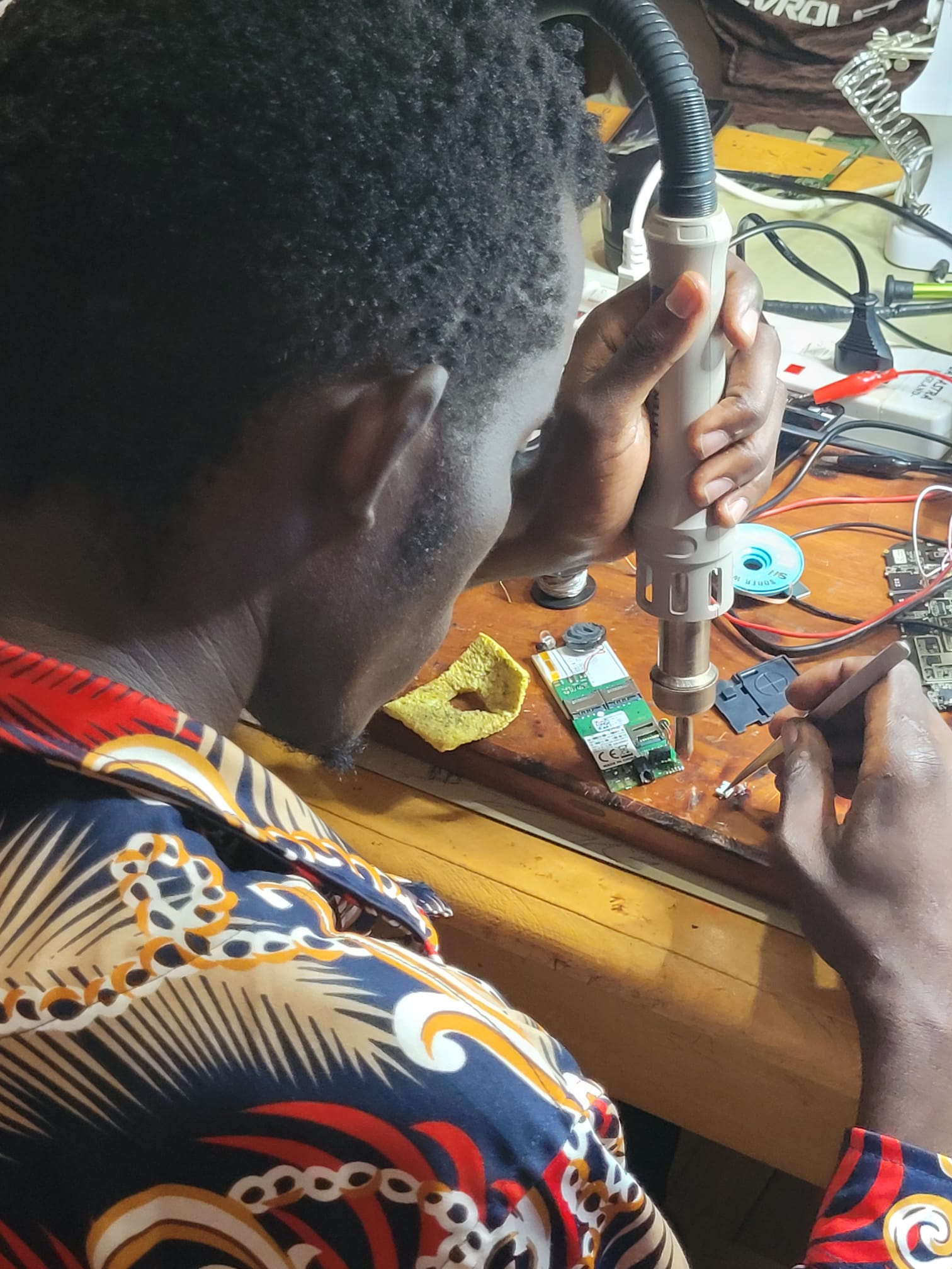 Through vocational skills to community benefit - TME Education Phone Repair Workshops.